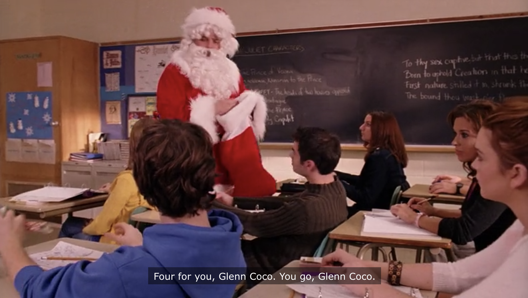 Damien handing Glenn Coco his four candy canes