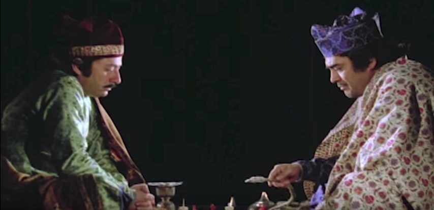 The stars of Shatranj Ke Khilari play a game of chess in a still from the film.