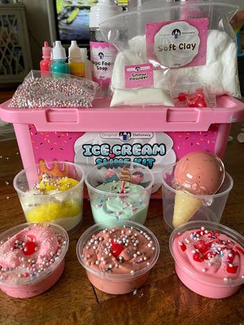 Reviewer's photo showing their slime ice cream creations sitting in front of the kit