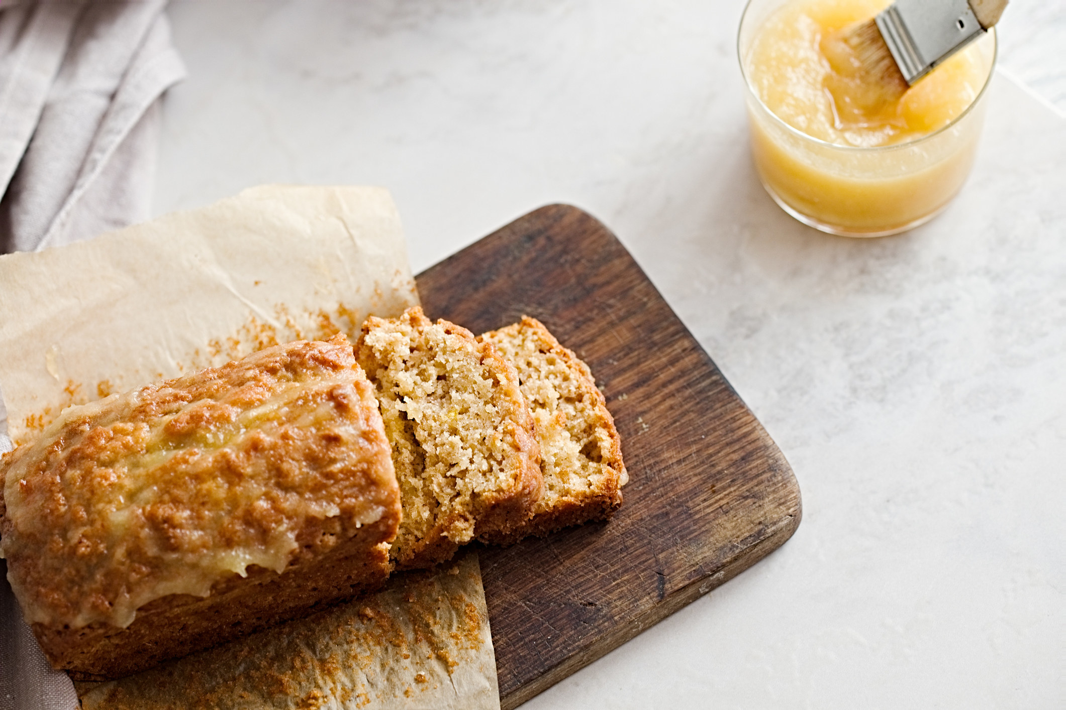 A loaf of oatmeal bread with apple sauce.