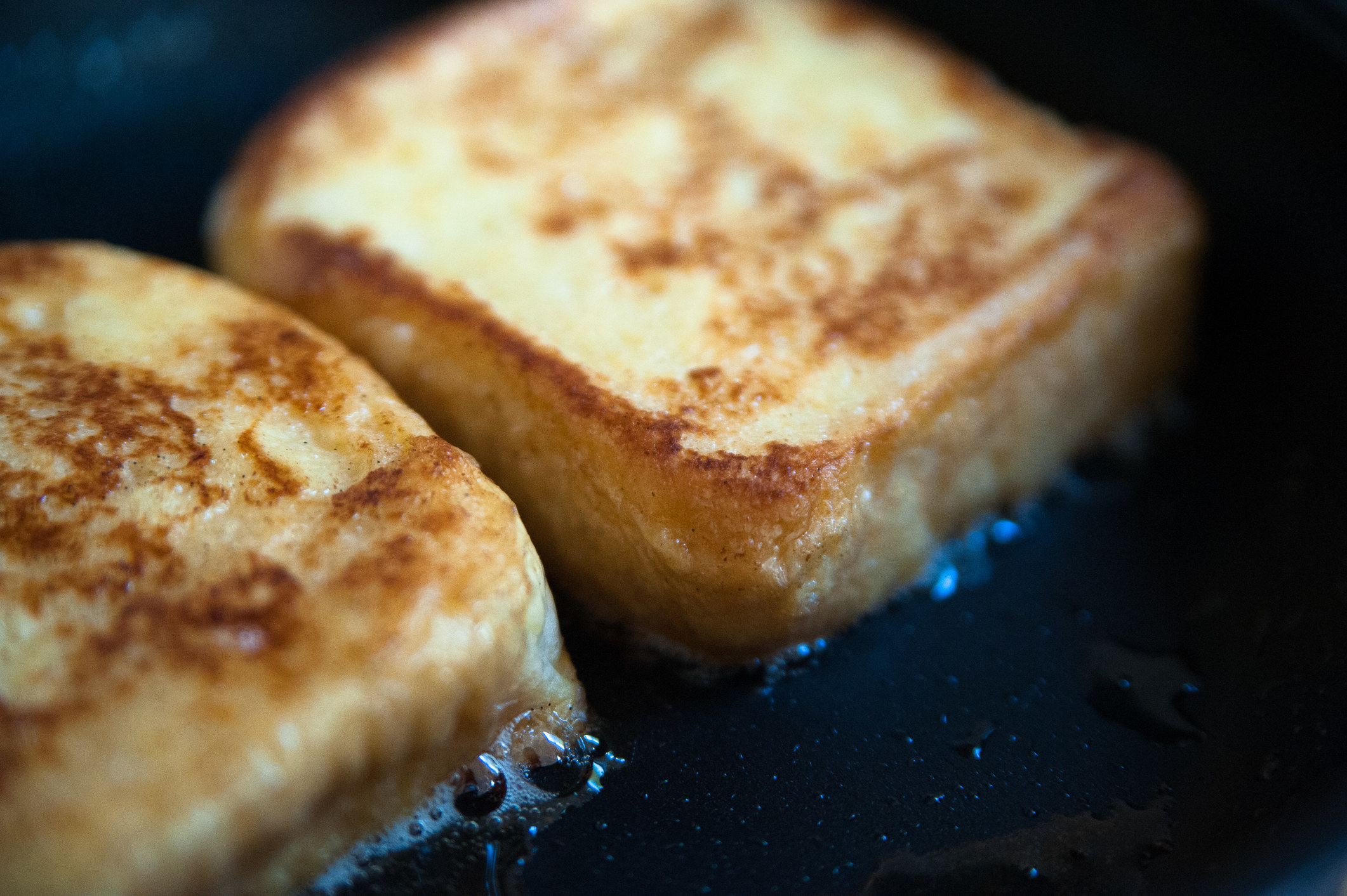 Cooking French toast in butter.