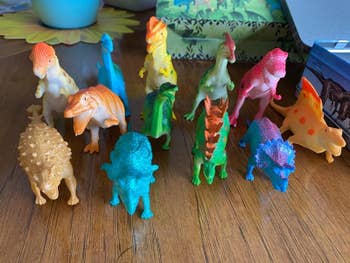 reviewer's close-up photo of the dinosaur toys
