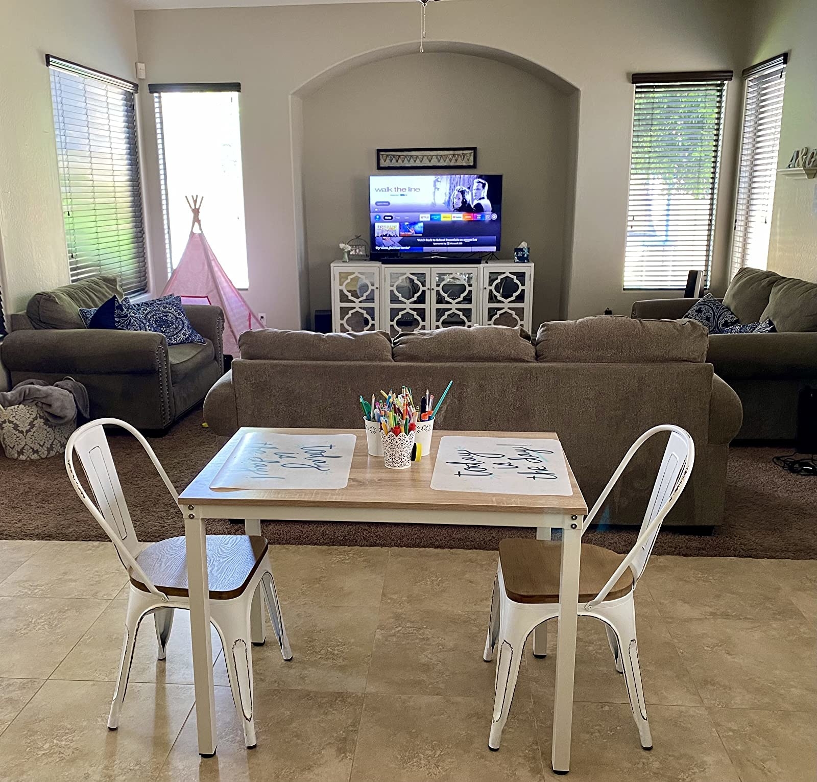 A reviewer's image of a multifunctional table that can be used in any room of your home