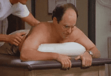 George Costanza flinches from masseuse