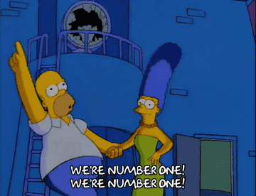 Gif of Homer Simpson running in a circle shouting, &quot;we&#x27;re number one&quot;