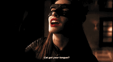 Catwoman says &quot;Cat got your tongue&quot;
