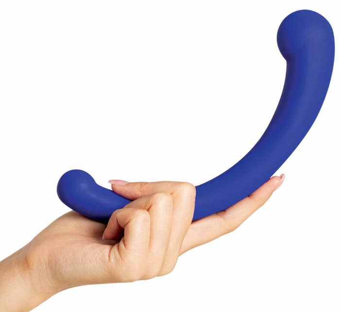 Model holding blue arc-shaped vibrator