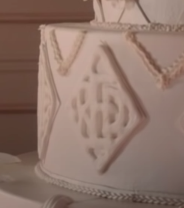 the red symbol on the wedding cake