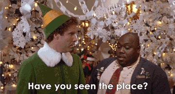 gif of buddy the elf and the manager of gimbles saying &quot;have you seen the place&quot;