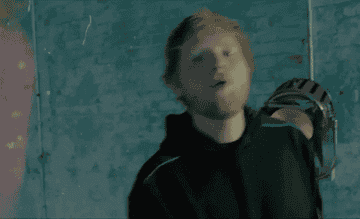 Ed Sheeran singing in the video of Nothing On You.