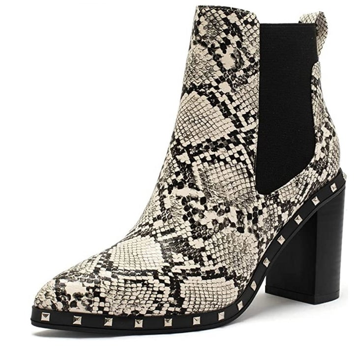 The same pointed toe chelsea boot heel with silver studded accents in snakeskin