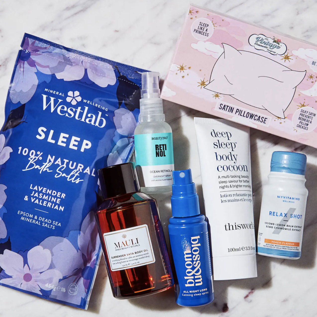 a flatlay of all the relaxing products included in the gift set