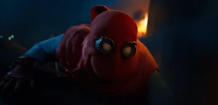 Spider-Man in his homemade suit holding onto a falling airplane in "Spider-Man: Homecoming"