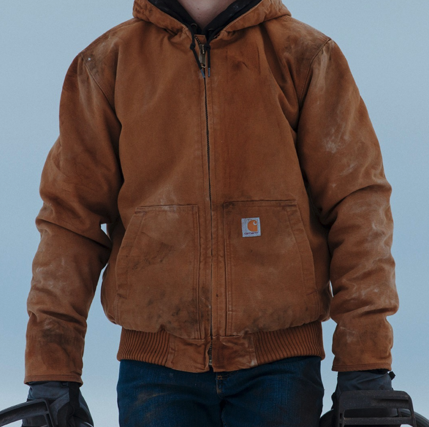 person wearing the Carhartt jacket with gloves