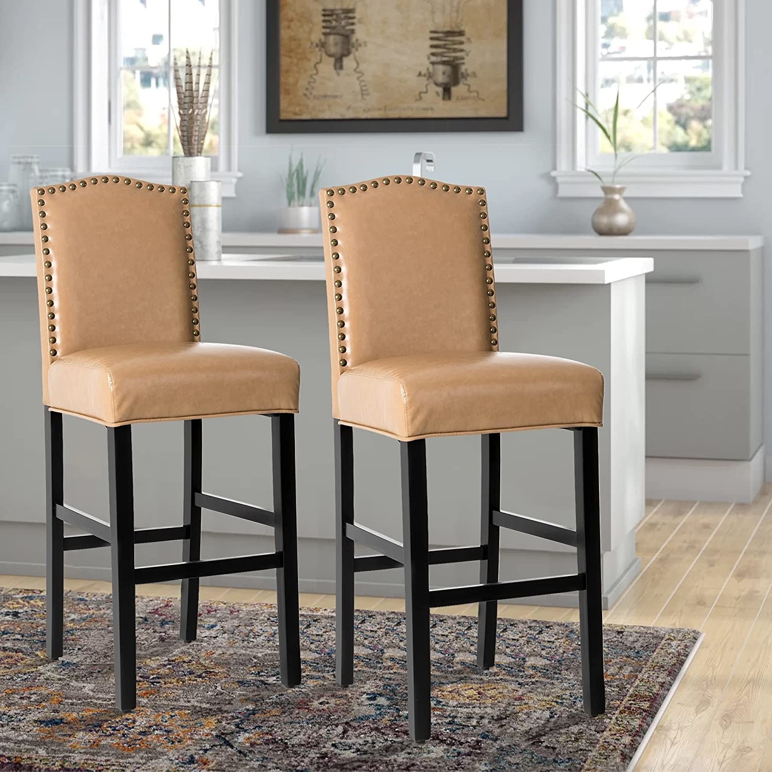 two beige dining chairs