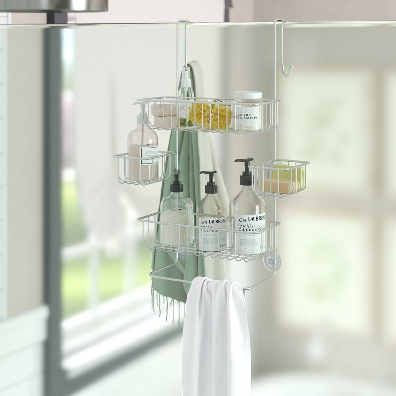 The over door shower caddy with assorted items inside