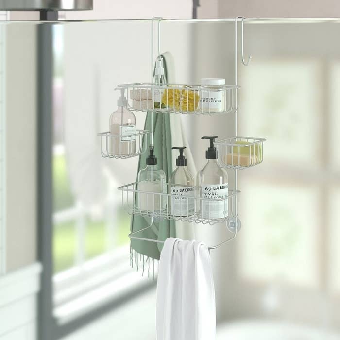 The over door shower caddy with assorted items inside