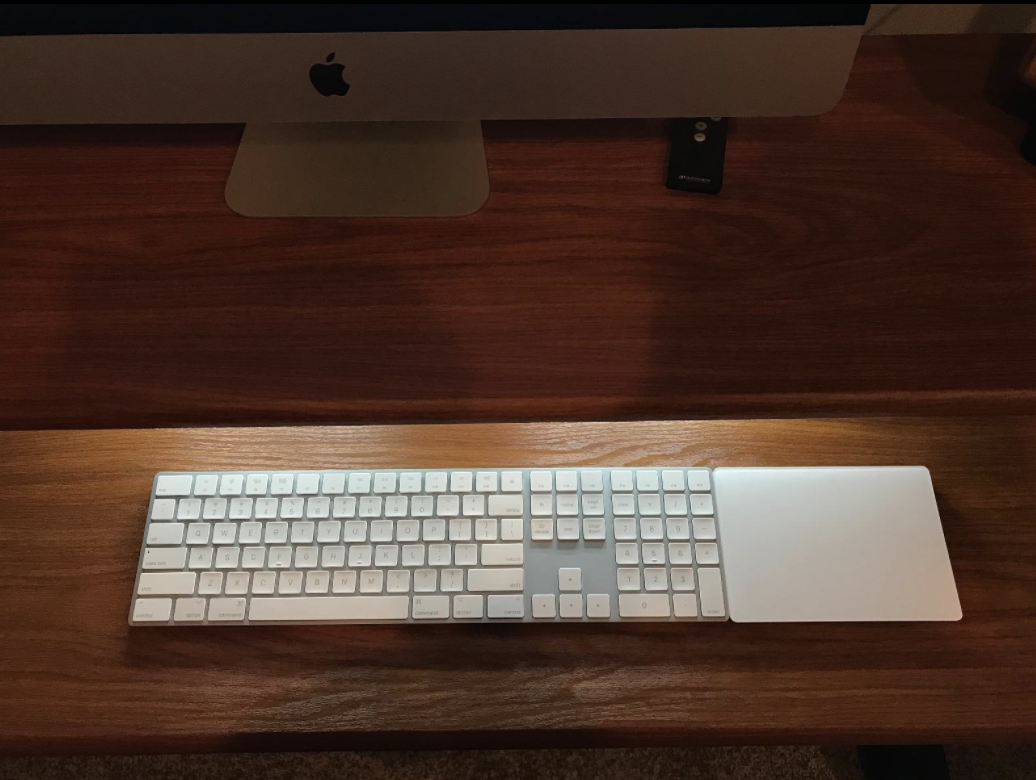 the keyboard in silver and white