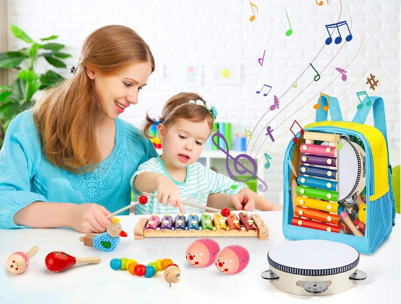 A parent and child playing with a xylophone