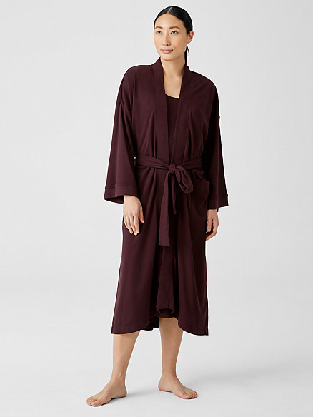 Model wearing the maroon robe