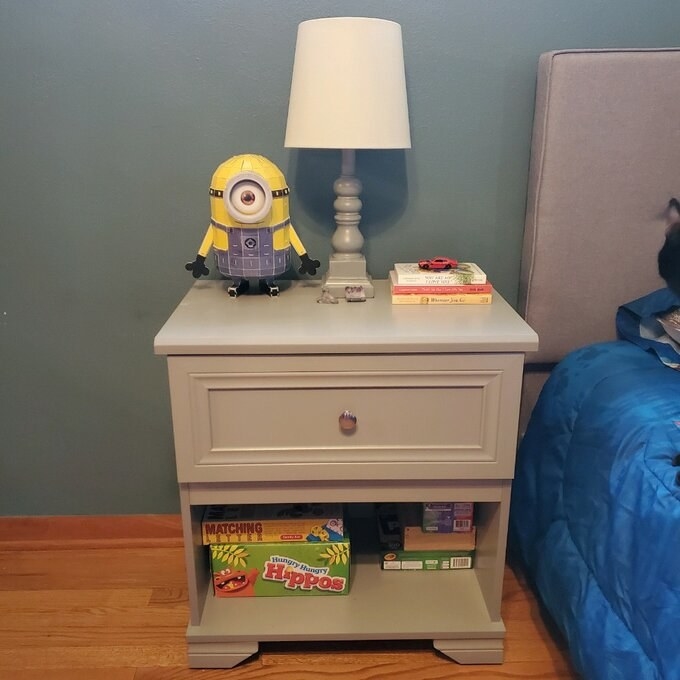 a reviewer photo of the nightstand in gray