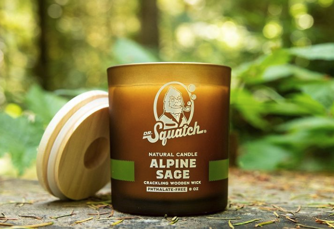 &quot;alpine sage&quot; scent candle styled outside
