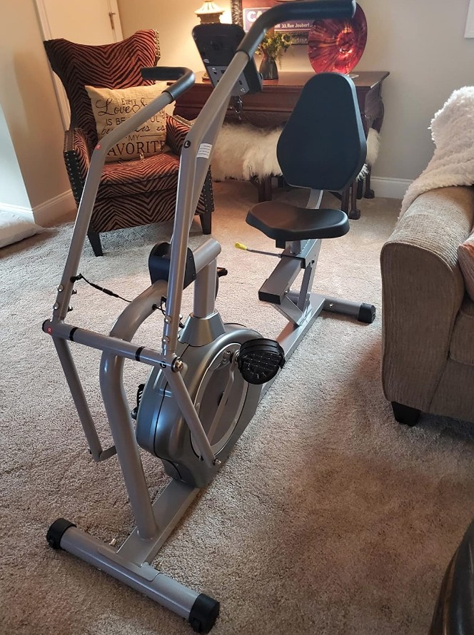 gray exercise bike with moveable handlebars in reviewer&#x27;s living room
