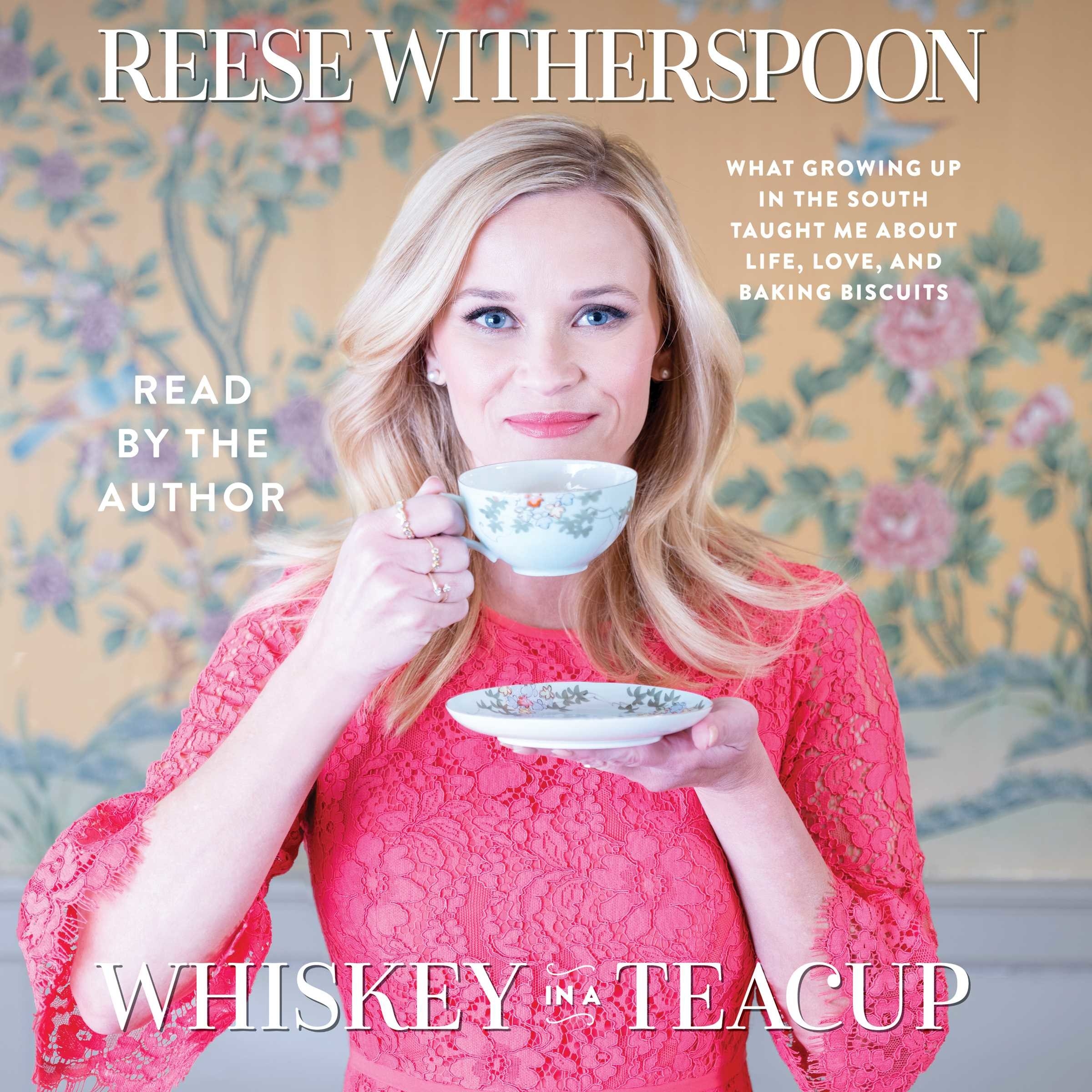 reese witherspoon drinking out of a teacup, with text that says whiskey in a tea cup, what growing up in the south taught me about life, love, and baking biscuits.