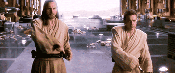GIF of Qui-Gon and Obi-Wan pulling out their lightsabers in Phantom Menace