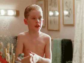 gif of kevin from home alone making a surprised face
