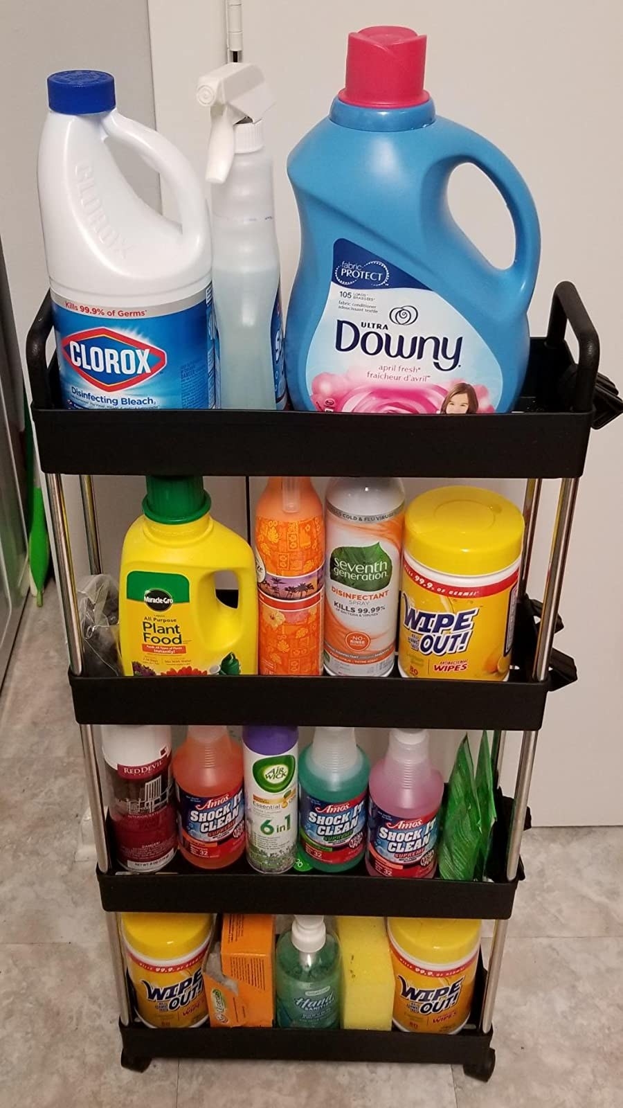 black kitchen cart with cleaning supplies