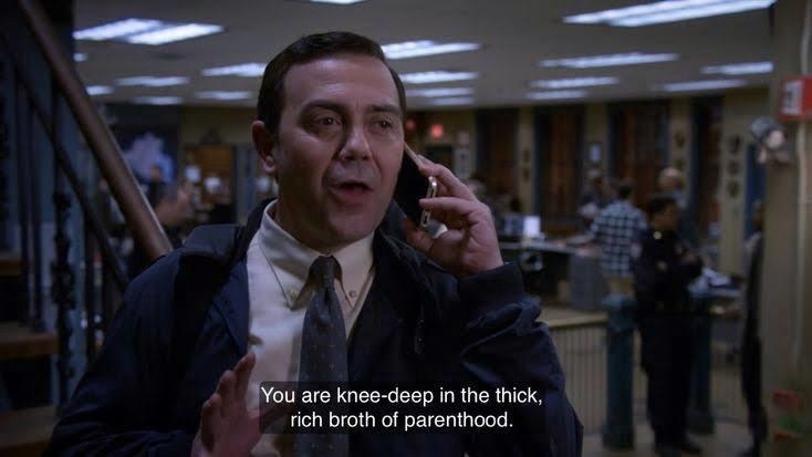 Joe Lo Trugilo, as his character Charles Boyle in Brooklyn Nine-Nine, talking on a phone