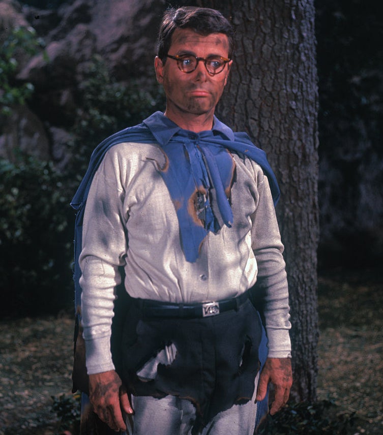 Bill Daniels in his baggy and moth-eaten costume poses as Captain Nice