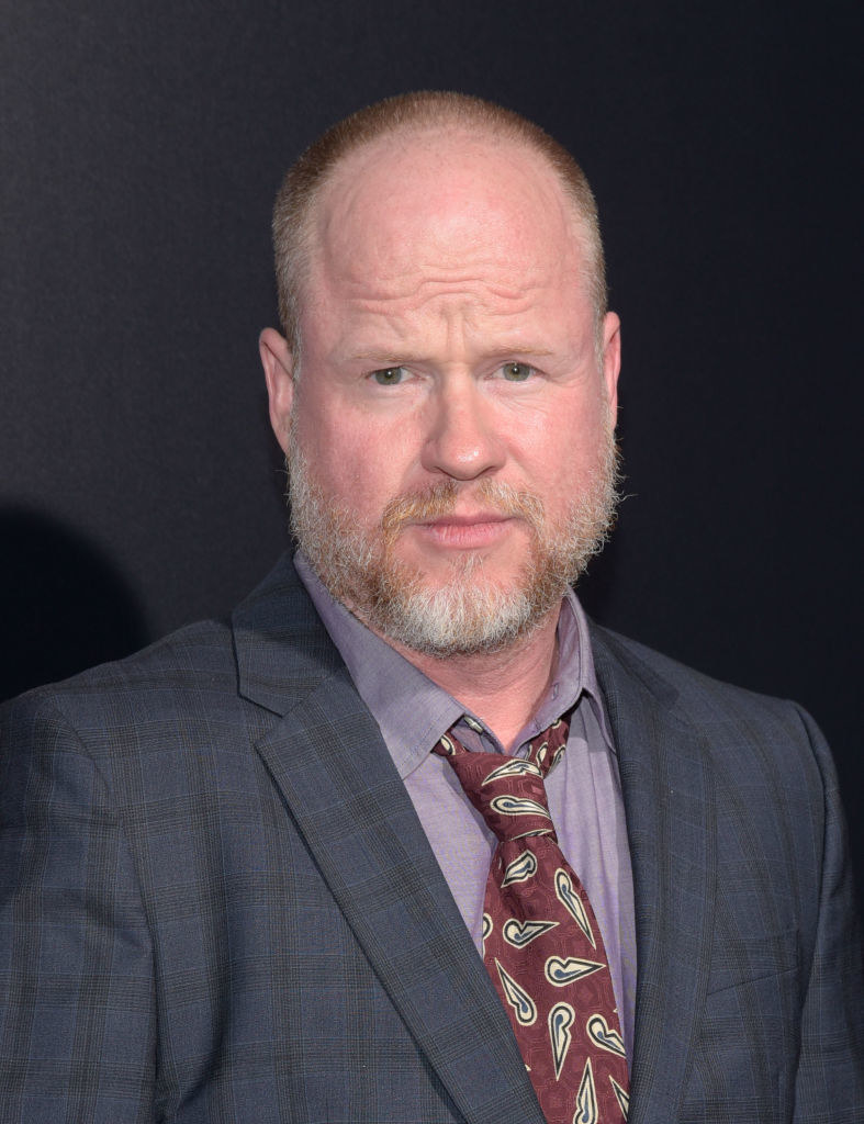 Joss Whedon in a suit and tue