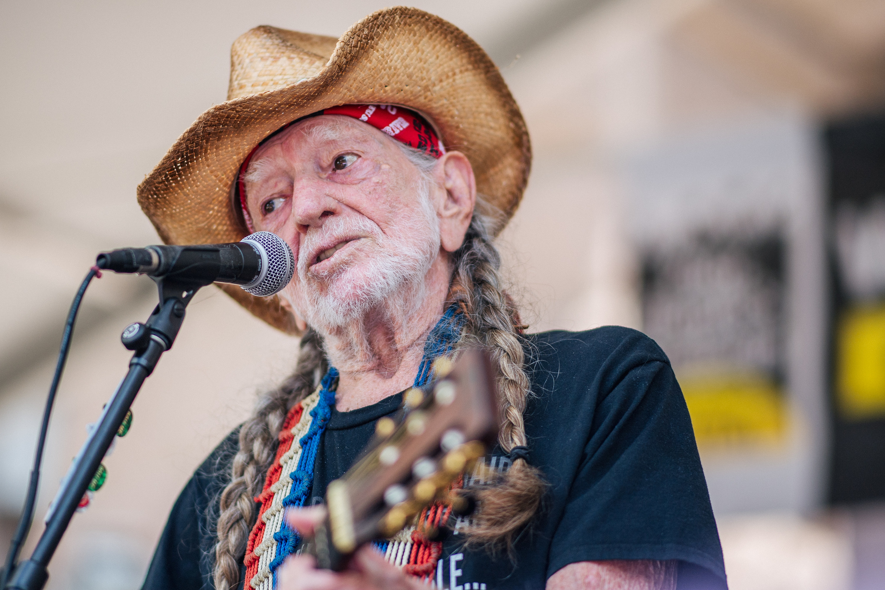 Willie Nelson performs during the Georgetown to Austin March for Democracy rally