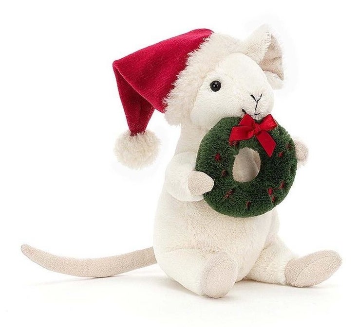 small mouse plush holding wreath and wearing santa hat
