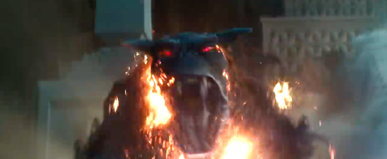 An evil doglike demon with giant horns, red eyes, and a flaming body