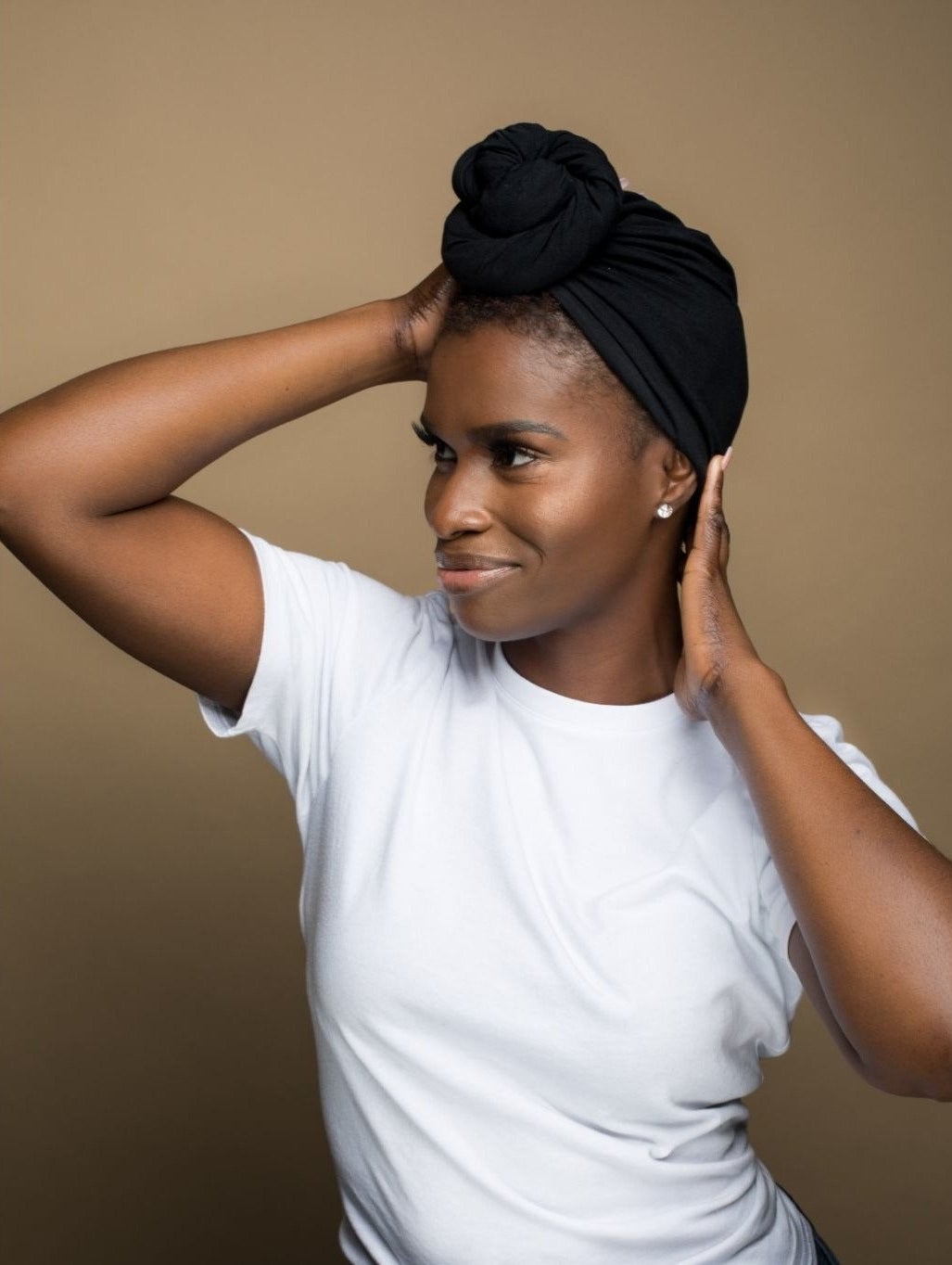 a model wearing the black t-shirt bun wrap