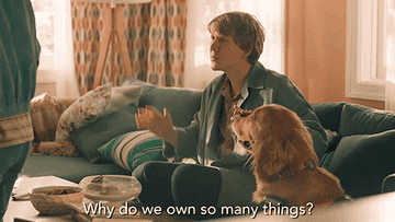 a gif of Josh Thomas in &quot;Everything&#x27;s gonna Be Okay&quot; saying &quot;why do we own so many things?&quot;