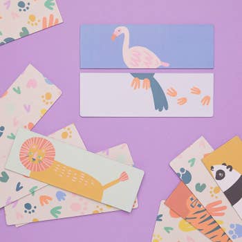 several tops and bottoms of animals cut in half and mix and matched on cards