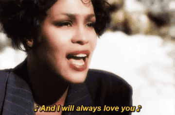 GIF of Whitney singing &quot;And I will always love you&quot;