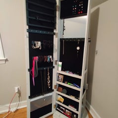 a reviewer photo of the inside of the armoire
