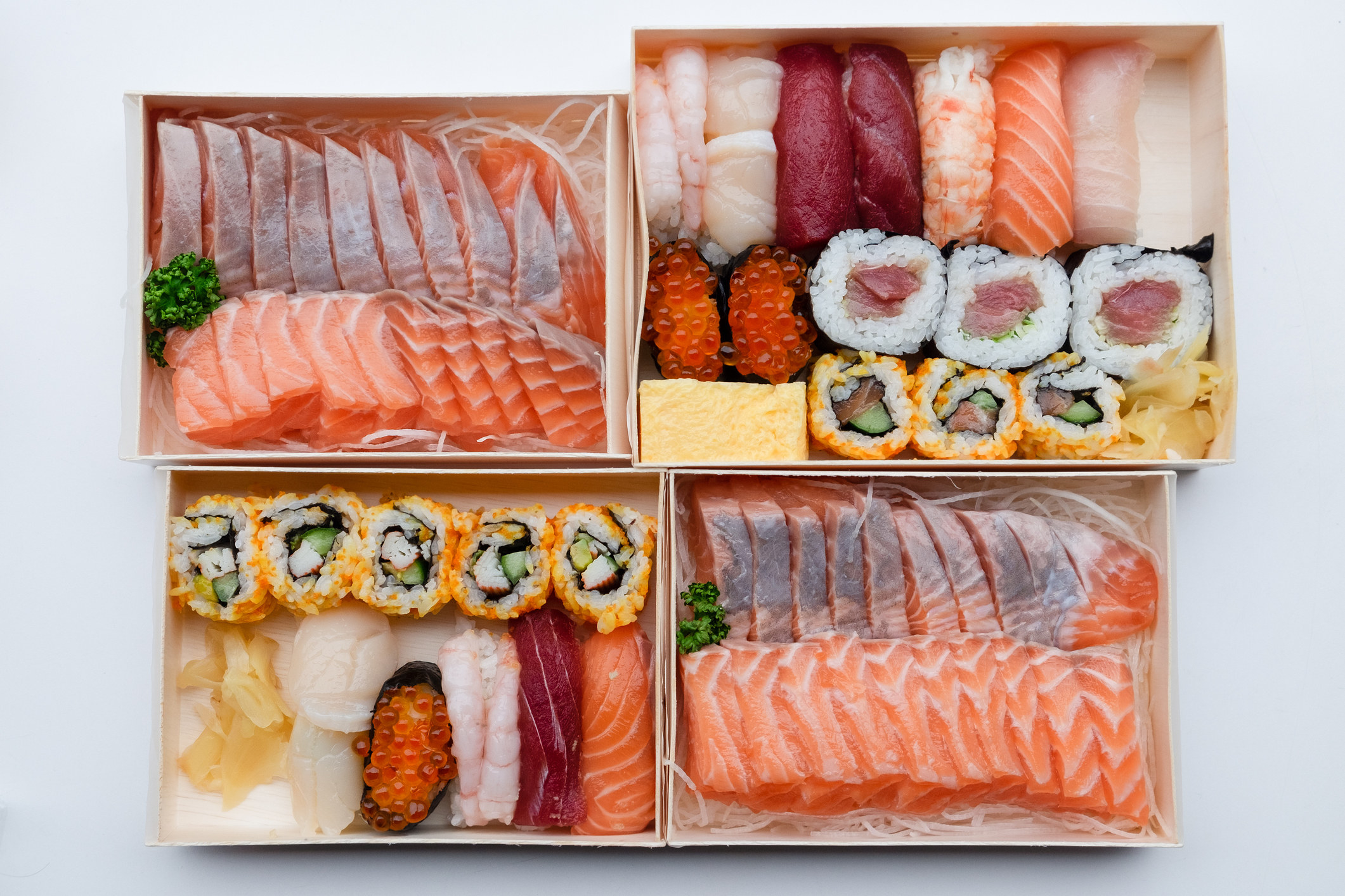 Boxes of fancy sushi.