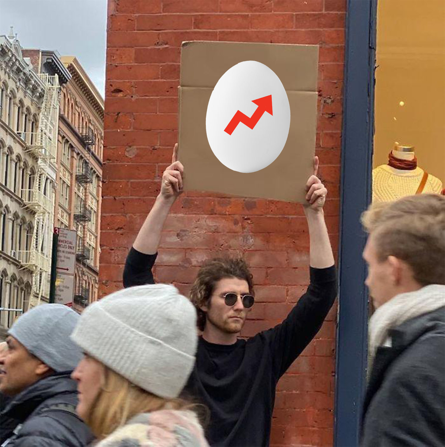 Meme with a guy holding up a sign, on the sign is an egg with the BuzzFeed logo.