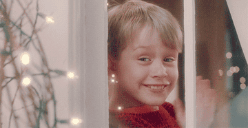 kevin from &quot;home alone&quot; waving at the window