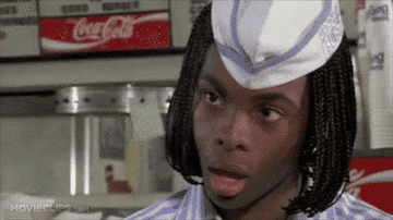 Kel Mitchell in the film Good Burger with his mouth open in surprise