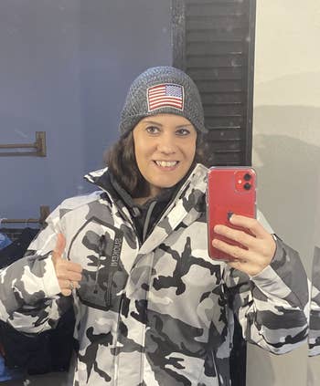 reviewer wearing ski jacket in white camo