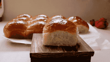 Bread being pushed down