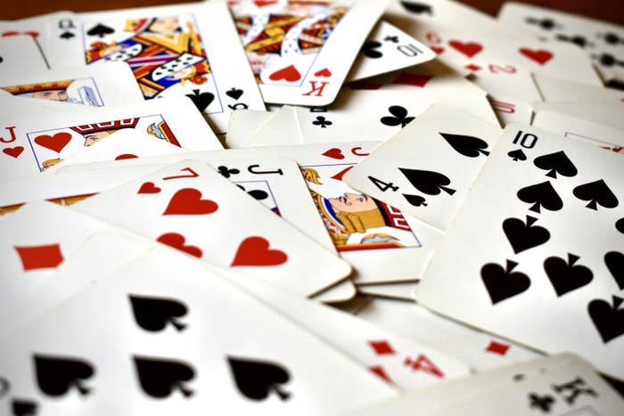 play cards scattered on the table