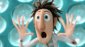 a gif of Flint Lockwood from Cloudy with a Chance of Meatballs making an exaggerated shocked face